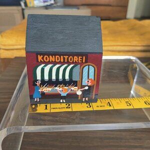 Swiss German Bakery Music Box, Painted in bright colors, Mom & children look in.